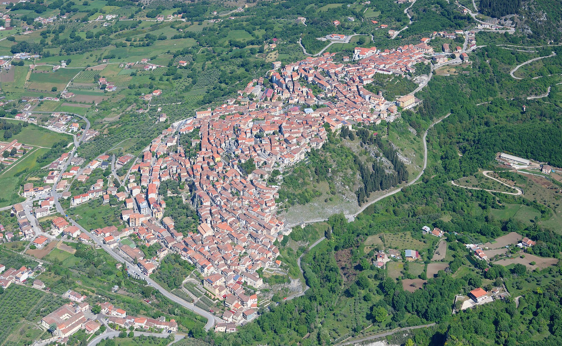 Aerial view of Padula from the southeast, its roofs following the ridge.